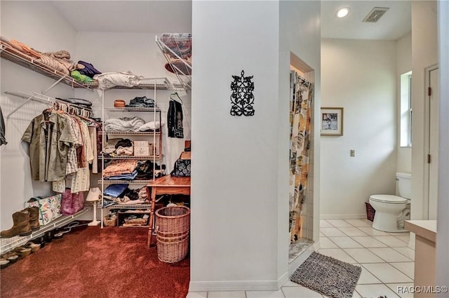 7802 N Fairwind Loop, Hernando, FL 34442 - spacious closet featuring tile patterned floors