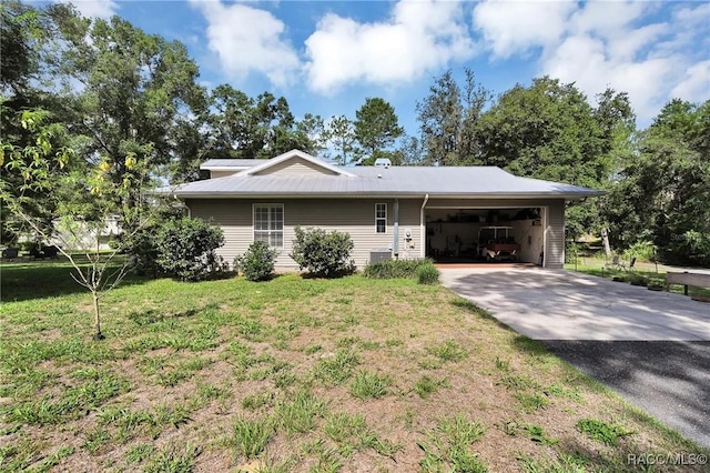 7802 N Fairwind Loop, Hernando, FL 34442 - single story home with driveway, a garage, and a front lawn