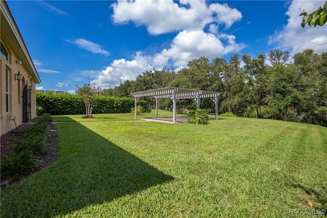 view of yard with a pergola