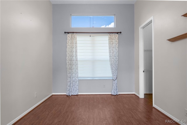 spare room featuring hardwood / wood-style floors