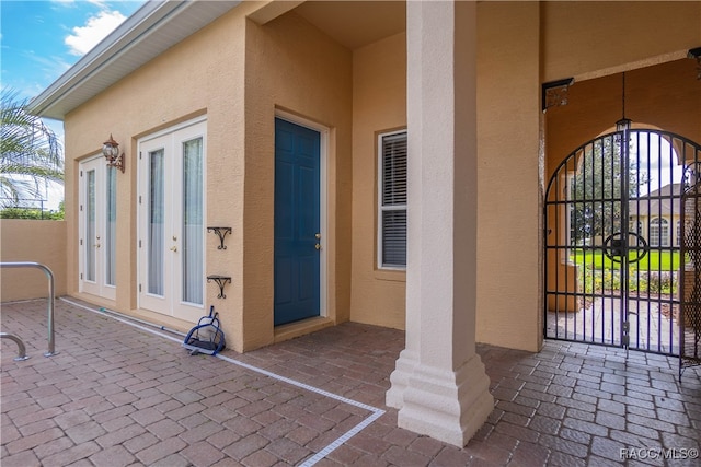 doorway to property featuring french doors