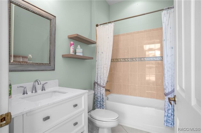 full bathroom with tile patterned flooring, vanity, toilet, and shower / tub combo