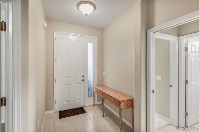 1052 W Diamond Shore Loop, Hernando, FL 34442 - entryway featuring light tile patterned flooring and baseboards