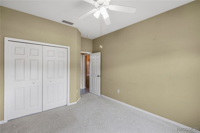 1052 W Diamond Shore Loop, Hernando, FL 34442 - unfurnished bedroom featuring carpet floors, a closet, baseboards, and a ceiling fan