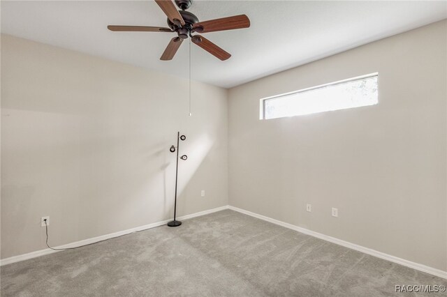 1052 W Diamond Shore Loop, Hernando, FL 34442 - unfurnished room with carpet floors, a ceiling fan, and baseboards