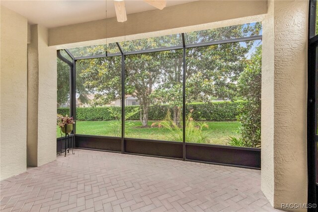 1052 W Diamond Shore Loop, Hernando, FL 34442 - unfurnished sunroom with a ceiling fan and plenty of natural light
