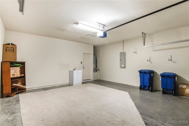 1052 W Diamond Shore Loop, Hernando, FL 34442 - garage with a garage door opener, electric panel, and water heater