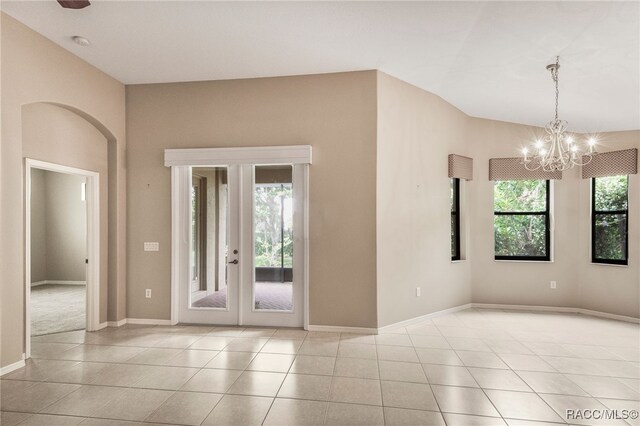 1052 W Diamond Shore Loop, Hernando, FL 34442 - tiled empty room with a chandelier, baseboards, a smoke detector, and french doors
