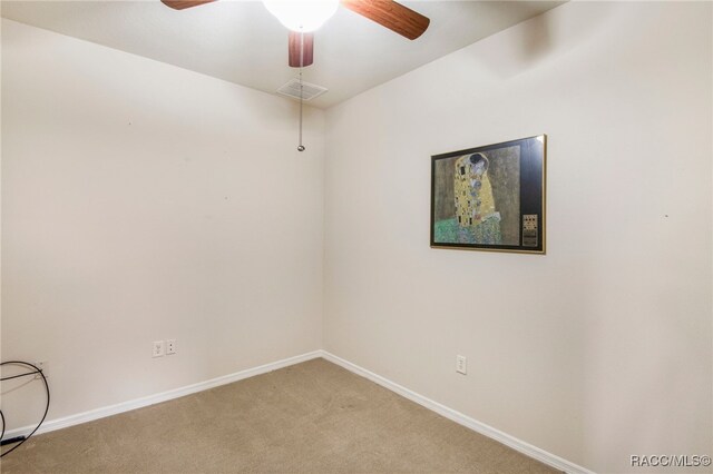1052 W Diamond Shore Loop, Hernando, FL 34442 - unfurnished room with light colored carpet, baseboards, and ceiling fan
