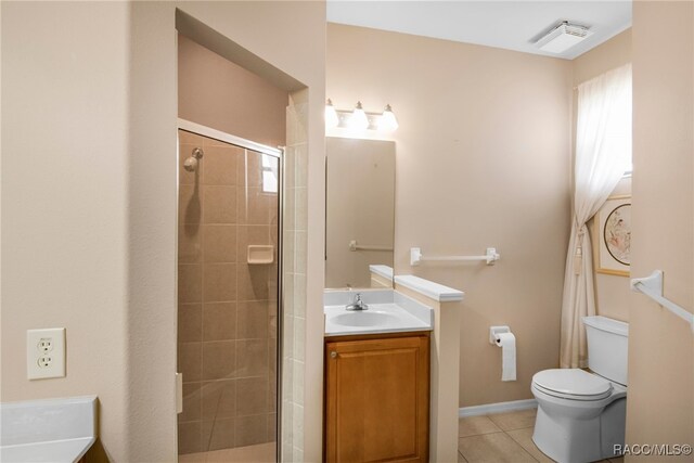 1052 W Diamond Shore Loop, Hernando, FL 34442 - full bath featuring vanity, a shower stall, toilet, and tile patterned floors