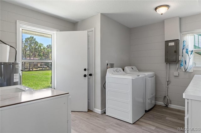 1930 NW 17th St, Crystal River, FL 34428 - kitchen featuring stainless steel refrigerator with ice dispenser, light wood-type flooring, white cabinetry, and baseboards