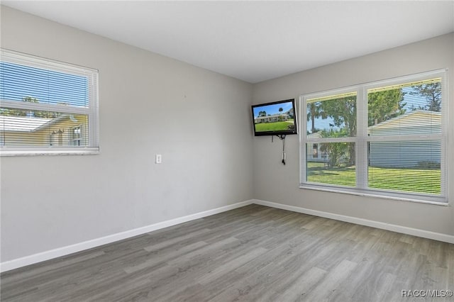 1930 NW 17th St, Crystal River, FL 34428 - kitchen with stainless steel appliances, under cabinet range hood, white cabinets, and a sink