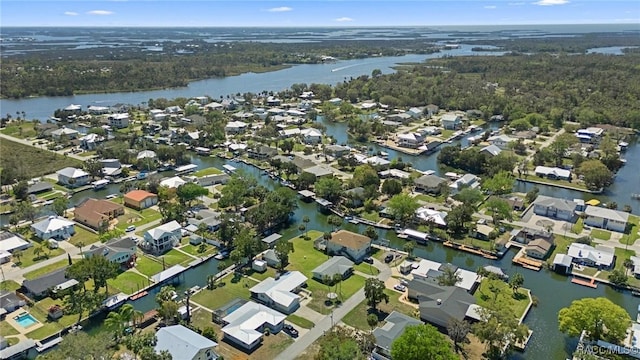 1930 NW 17th St, Crystal River, FL 34428 - aerial view of property and surrounding area featuring a large body of water and nearby suburban area