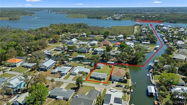 1930 NW 17th St, Crystal River, FL 34428 - aerial view of residential area with property boundaries highlighted and a nearby body of water
