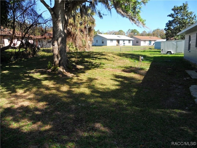 view of yard featuring fence