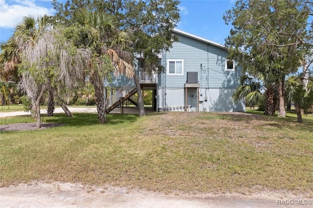 5500 S Cedar Mill Path, Homosassa, FL 34448 - view of property exterior with a yard and stairway