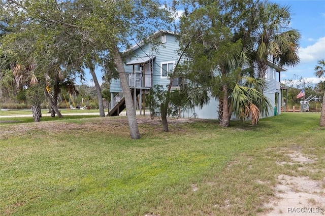 5500 S Cedar Mill Path, Homosassa, FL 34448 - view of property exterior with a lawn and stairs