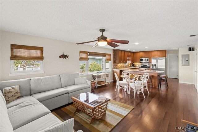5500 S Cedar Mill Path, Homosassa, FL 34448 - living room featuring electric panel, dark wood-style floors, ceiling fan, recessed lighting, and a textured ceiling