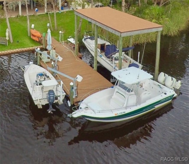 5500 S Cedar Mill Path, Homosassa, FL 34448 - dock area featuring a lawn, a water view, and boat lift