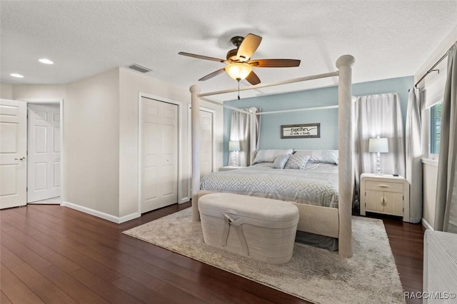 5500 S Cedar Mill Path, Homosassa, FL 34448 - bedroom with a textured ceiling, dark wood finished floors, recessed lighting, and a ceiling fan