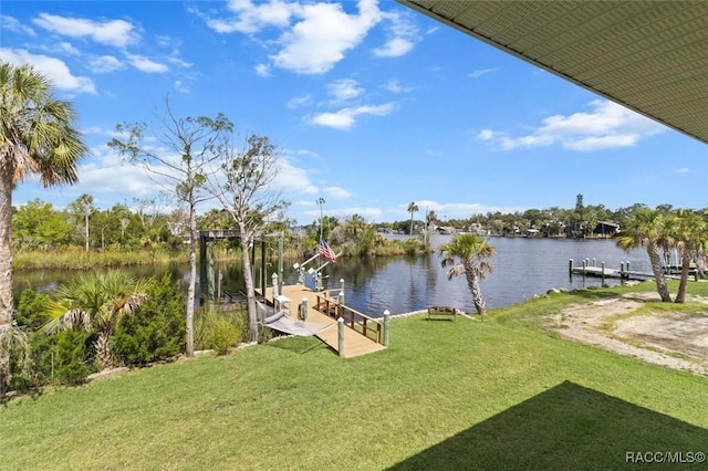 5500 S Cedar Mill Path, Homosassa, FL 34448 - dock with a yard, a water view, and boat lift