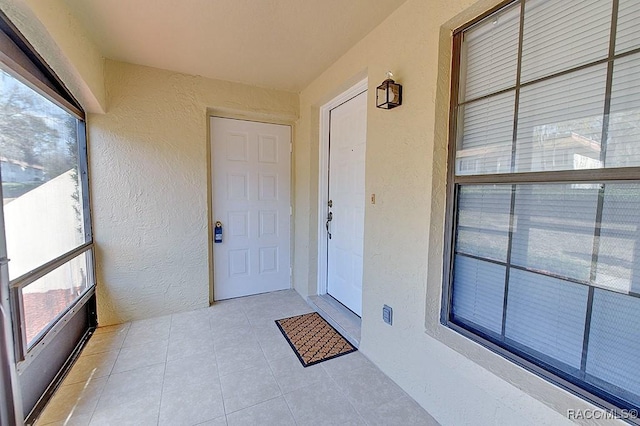 doorway to property featuring a balcony