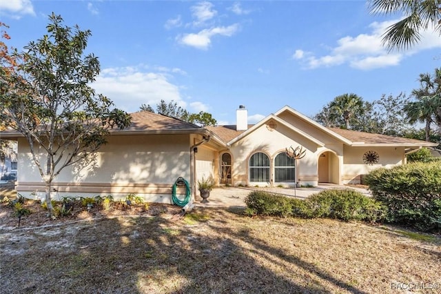 single story home featuring a patio area