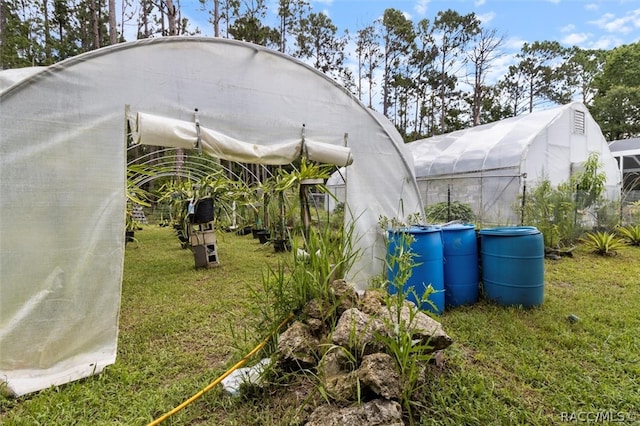 view of yard with an outdoor structure