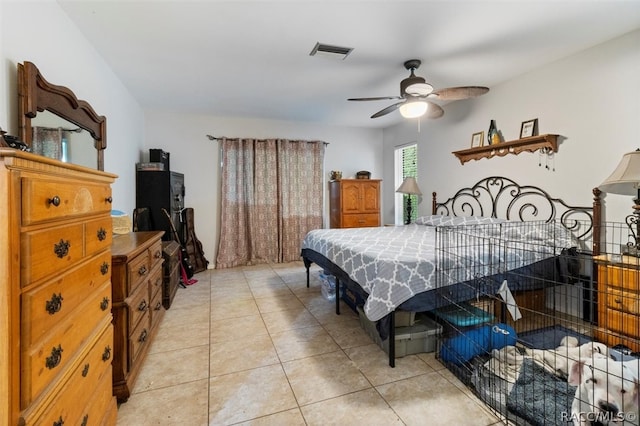 bedroom with light tile patterned floors and ceiling fan