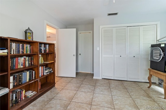 interior space with light tile patterned floors