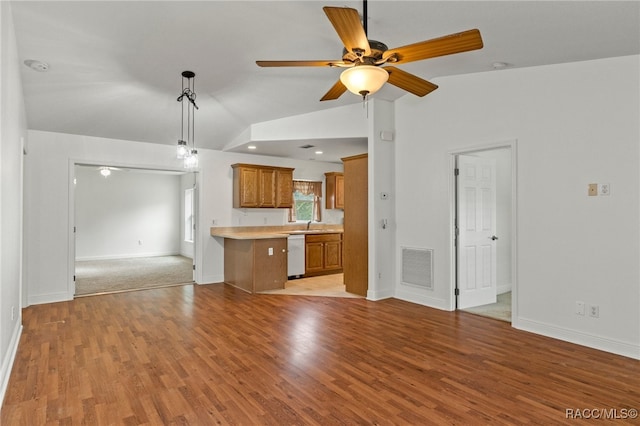 unfurnished living room featuring lofted ceiling, ceiling fan, and light hardwood / wood-style floors