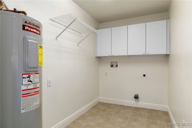 washroom with washer hookup, cabinets, water heater, and hookup for an electric dryer