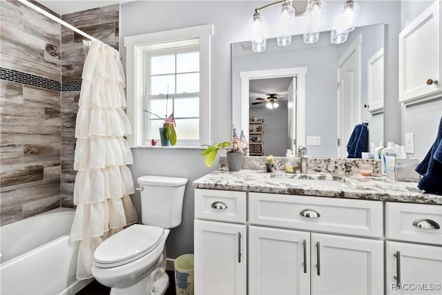 full bathroom featuring vanity, toilet, and shower / bath combo with shower curtain