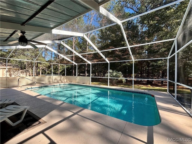 view of pool featuring a lanai and a patio area