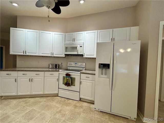 kitchen featuring decorative backsplash, white appliances, white cabinetry, and ceiling fan