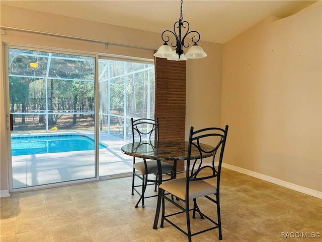 dining room featuring a chandelier