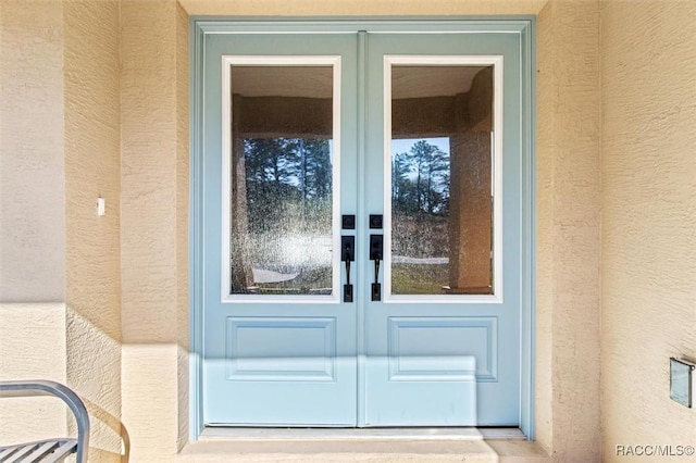 view of exterior entry with french doors