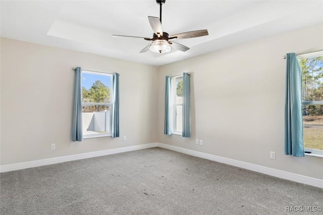 unfurnished room with carpet floors and ceiling fan