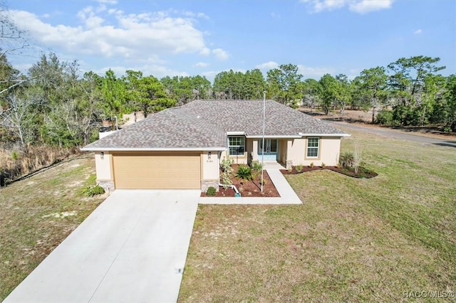 ranch-style house featuring a garage and a front lawn