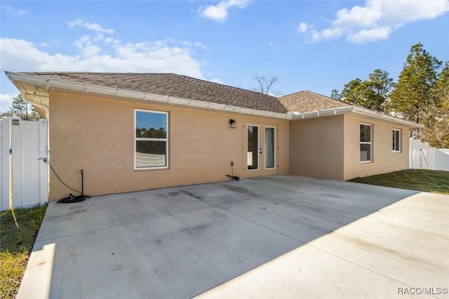 rear view of house with a patio area