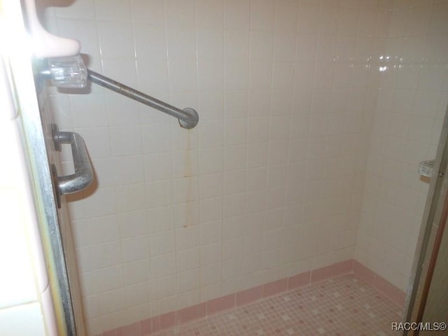 bathroom featuring a stall shower