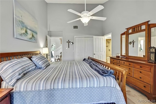 2891 N Rivers Edge Blvd Unit 100, Crystal River, FL 34429 - bedroom with a high ceiling, a closet, and a ceiling fan