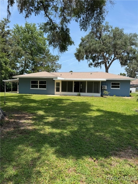 1464 NW 22nd St, Crystal River, FL 34428 - back of property with a yard and stucco siding