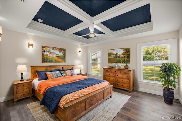 bedroom with multiple windows, ornamental molding, ceiling fan, beam ceiling, and coffered ceiling