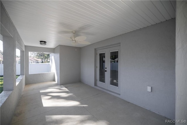 view of patio / terrace with ceiling fan and french doors