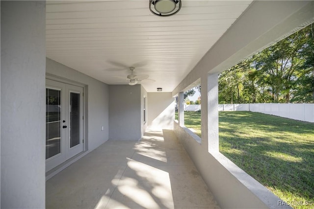 view of patio with ceiling fan and french doors