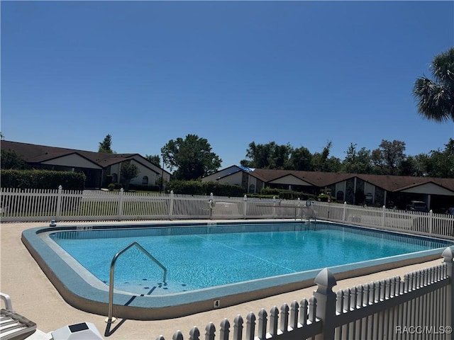 community pool with fence
