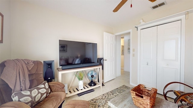 living room with ceiling fan