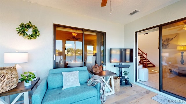 interior space featuring ceiling fan