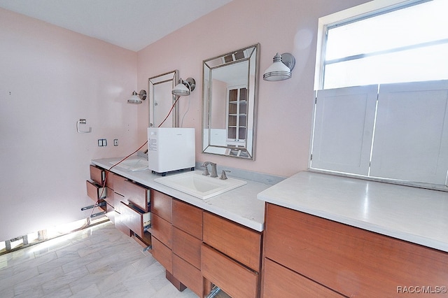 bathroom featuring sink